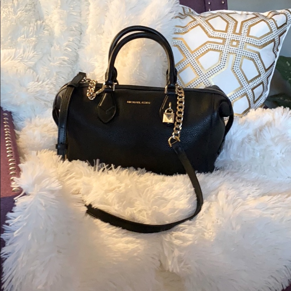 Michael Kors black Top handle or Cross body bag.